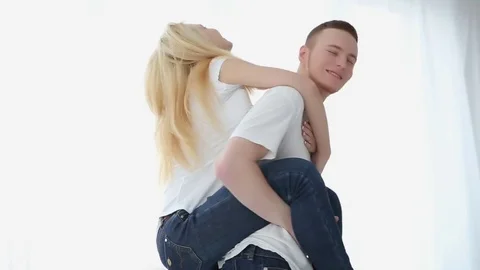 Beautiful couple in love having fun at home Stock-Footage 76923475