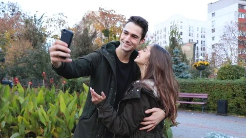 Beautiful couple make selfies Stock Footage 101208290