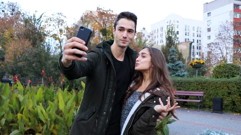 Beautiful couple make selfies Stock Footage 101209522
