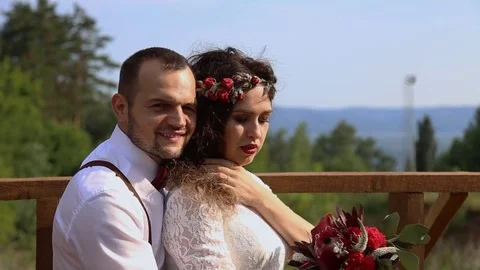 Beautiful couple posing outdoors. Video stock 69888724