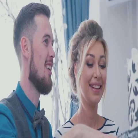 Beautiful couple preparing for the wedding of the future. Wedding cake Stock-Footage 69633342
