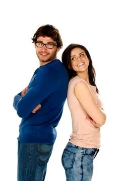 Beautiful couple stood back to back isolated on a white background Stock Photos