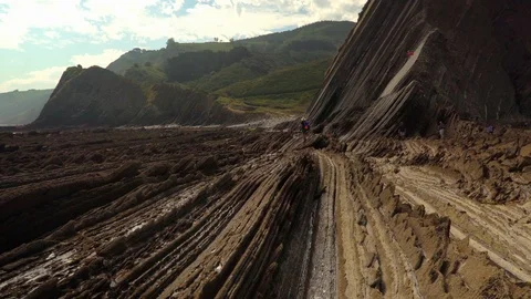 Beautiful crane down shot of slippery rocks Stock Footage 112294187