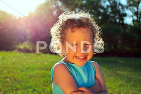 Beautiful curly girl Stock Photos