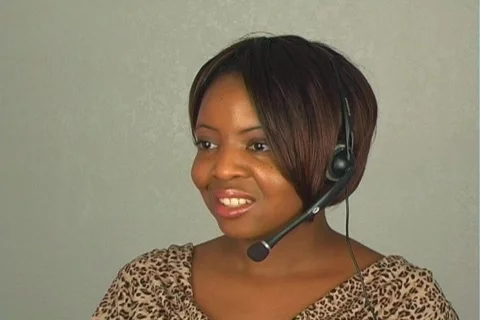 Beautiful Customer Service Operator with Headset Microphone Stockbeeldmateriaal 526857