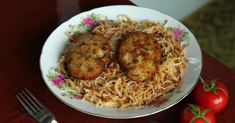 Beautiful cutlet with pasta Stock Footage 133404719