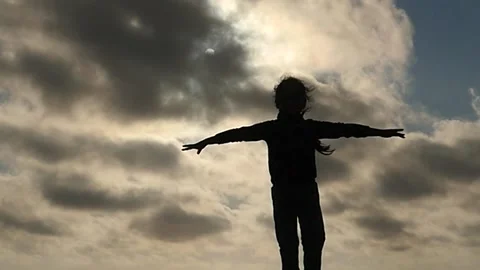 Beautiful dance with sun and clouds background silhouette Stock Footage 197425283
