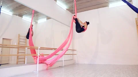 Beautiful dancer on aerial silk in studio Stock Footage 65516016