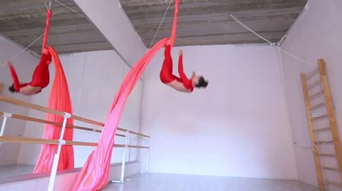 Beautiful dancer on aerial silk in studio Stock Footage 65516389