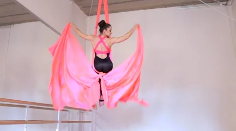 Beautiful dancer on aerial silk in studio Stock Footage 65516473