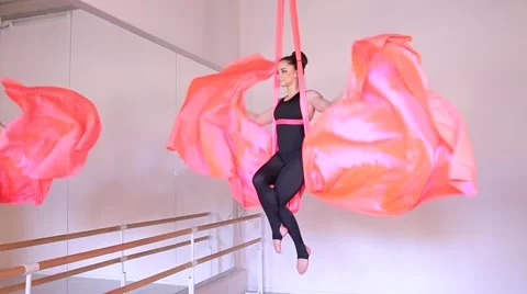 Beautiful dancer on aerial silk in studio Stock Footage 65516481