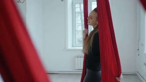 Beautiful dancer posing with aerial fabric Stock Footage 76417160
