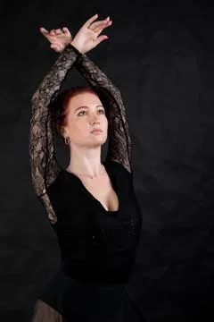 Beautiful dancer studio portrait posing on black background. Stock Photos