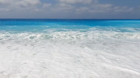 Beautiful but dangerous waves of the famous Myrtos beach in Kefalonia Stock Footage 328163045