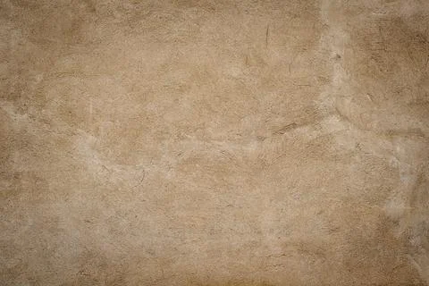 Beautiful dark beige rough cement plaster with vignette Stock Photos