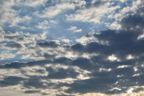 Beautiful dark clouds on a sunset Stock Photos