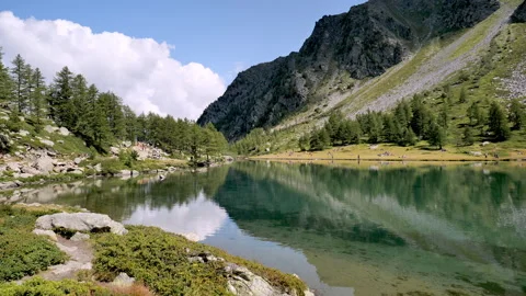 Beautiful D'Arpy Lake with mountains reflection Stock Footage 168693580