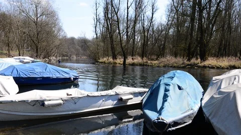 Beautiful day in late winter while passing a canoe Stock-Footage 87340432