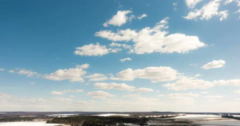 Beautiful daytime timelapse of clouds over the winter landscape Stock Footage 88480678