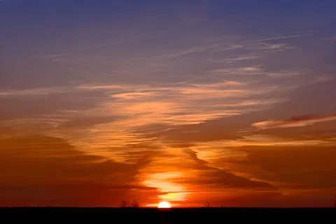 	Beautiful decline on which it is visible half of sun Stock Photos