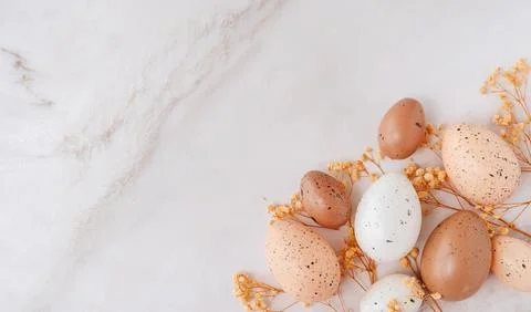 Beautiful decorated Easter eggs on light background, flat lay. Stock-Fotos