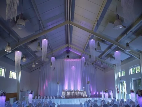 Beautiful decorated hall for wedding in purple light 스톡 동영상 78612349