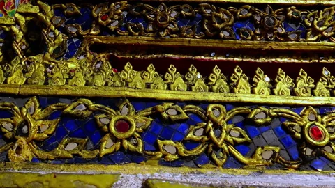 Beautiful decorations at chedi inside Buddhist temple Stock Footage 141153185