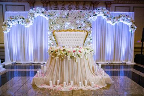 Beautiful decorations on wedding table for bride and groom. Stock Photos