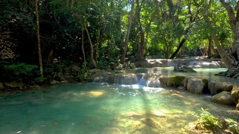 Beautiful deep forest waterfalls at Erawan water falls national park, in Th.. Stock Footage 310475436