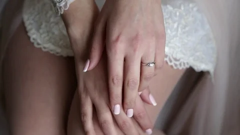 Beautiful delicate hands of the bride Stock Footage 81320223
