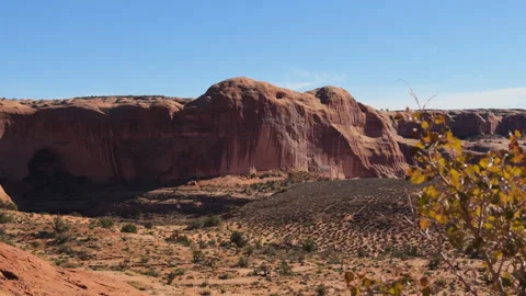Beautiful desert mesa landscape with dramatic cliffs and sparse vegetation in Stock Footage 308620919