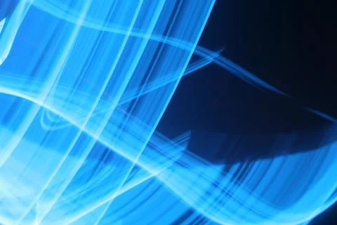 Beautiful digital blue light pattern on dark background. Stock Illustration