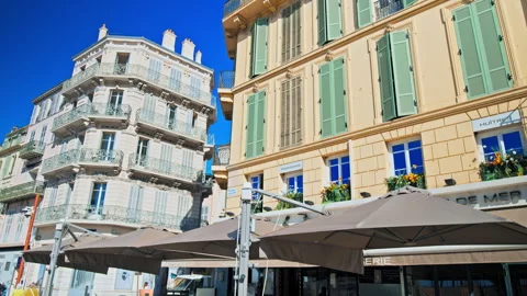 Beautiful dining tables set up for dinner in Cannes. Stock Footage 247219184