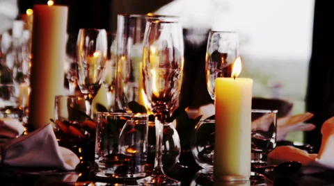 Beautiful Dinner Table Setup with Candles Stock Footage 41611893