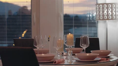 Beautiful Dinner Table Setup With Candles Stock Footage 139333314