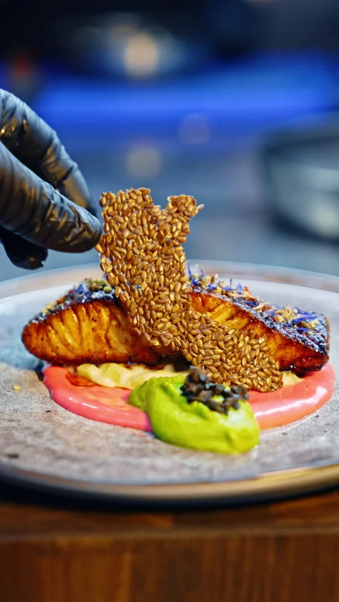 A beautiful dish of fried salmon with two sauces. Stock Footage 274548180