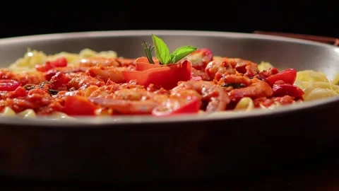 Beautiful dish with prawns, spaghetti and tomato sauce Stock Footage 130454521