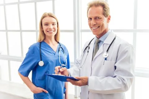 Beautiful doctors working Stock Photos