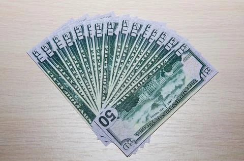 Beautiful Dollars on a table night background. American, US Dollars Cash Mone Stock Photos
