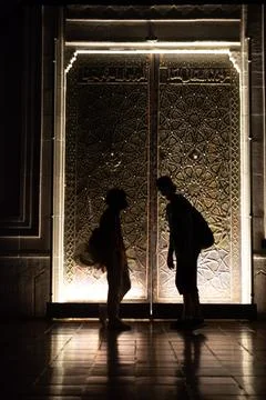 Beautiful door with geometric pattern of ancient Turkish  style and people .. Stock Photos