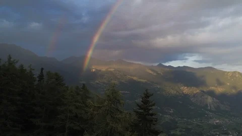 Beautiful double alpine rainbow Stock Footage