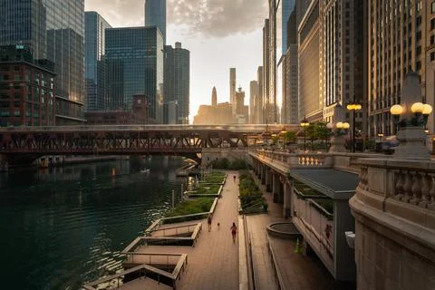 Beautiful downtown Chicago morning along the river as people jog on the path Stock Photos