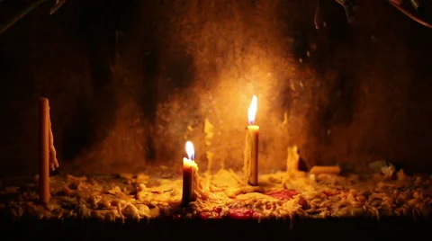 Beautiful dramatic candle lights and melting wax Stock Footage 58449912