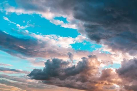 Beautiful dramatic clouds in the evening sky Stock Photos