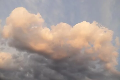 Beautiful dramatic clouds in the sky. The vast and clouds sky. Stock Photos