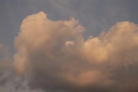 Beautiful dramatic clouds in the sky. The vast and clouds sky. Stock Photos