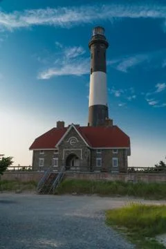 Beautiful dramatic color vertical frame shot of generic light house Stock Photos