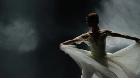 Beautiful dramatic dance, elegant woman in a white tutu, ballerina perform Stock Footage 259378063