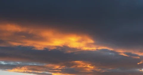 Beautiful dramatic nature clouds in red, orange, purple sunrise. 4k UHD Stock Footage 107470268