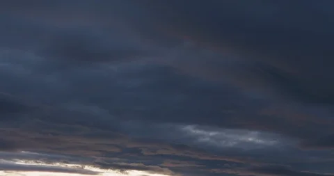 Beautiful dramatic nature clouds in red, orange, purple sunrise. 4k UHD Stock Footage 107473010